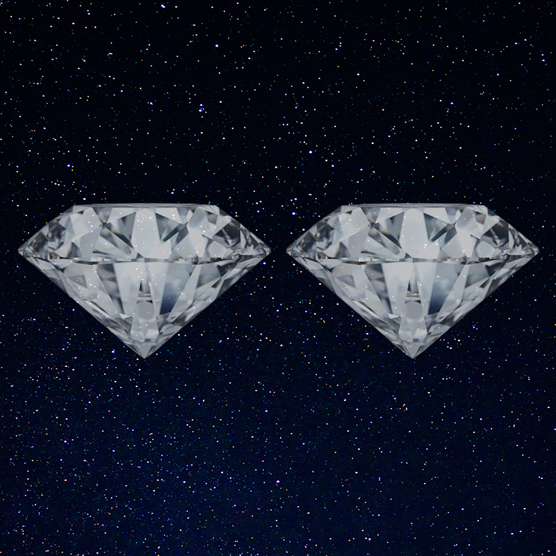 image of two diamonds with dark sparkly background