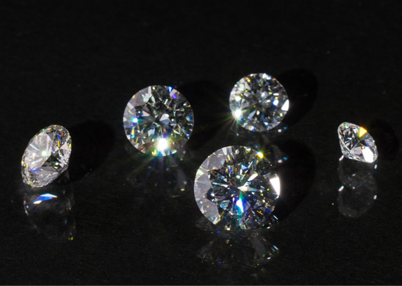 Group of sparkling Therapy Diamonds on black background
