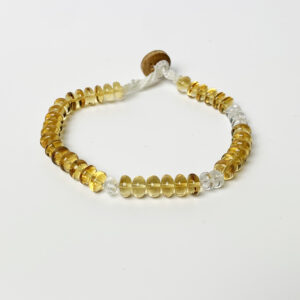 Citrine and White Beryl bracelet with wooden clasp on white background