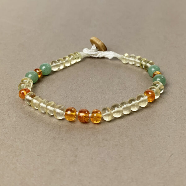 Therapeutic-quality golden beryl gemstone bracelet with wood clasp