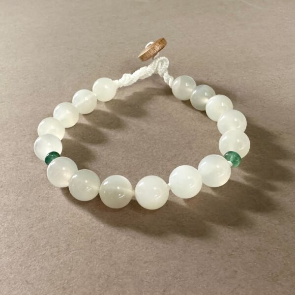 Gemstone bracelet with round White Flash Moonstone and Emerald beads.