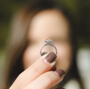 Woman holding Diamond ring